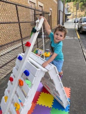 Photo of Boy Wall Climbing